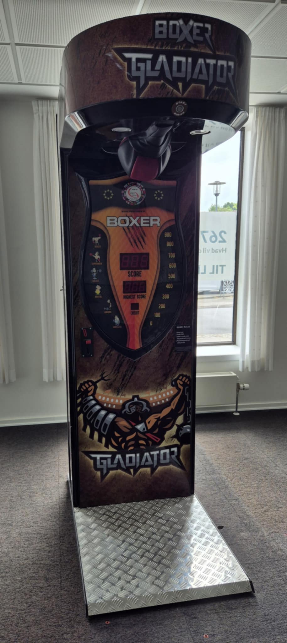 Eight shirts arranged on table in black, olive, grey, blue, white, red, mustard, and green.