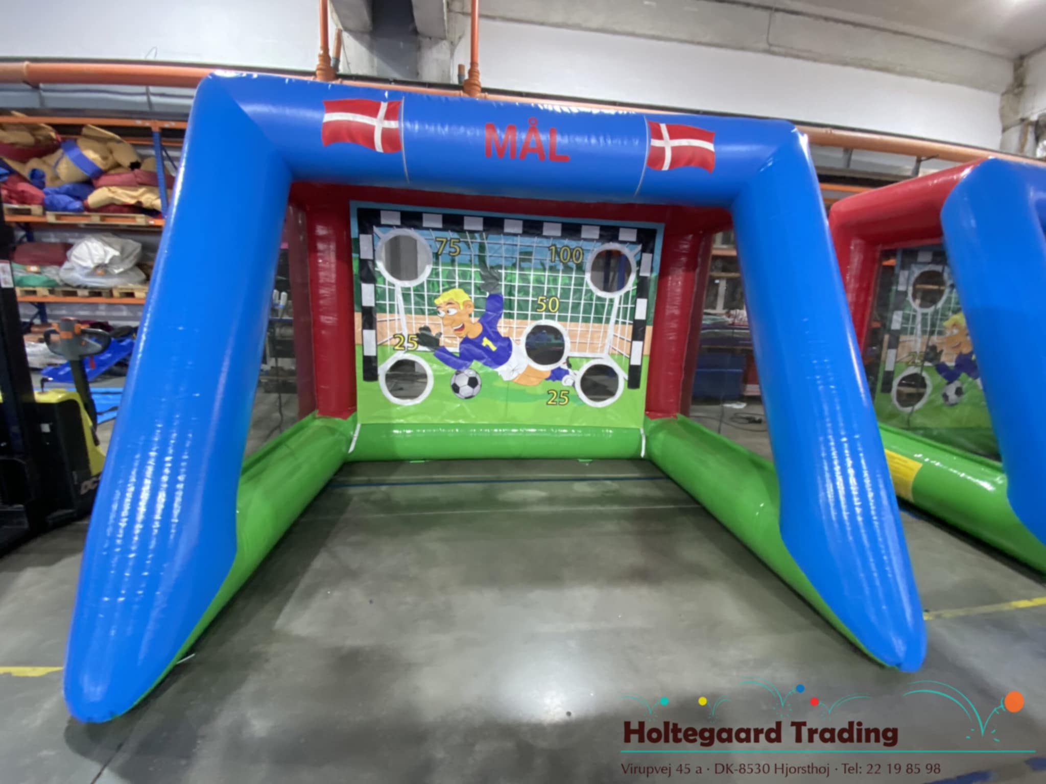 Eight shirts arranged on table in black, olive, grey, blue, white, red, mustard, and green.